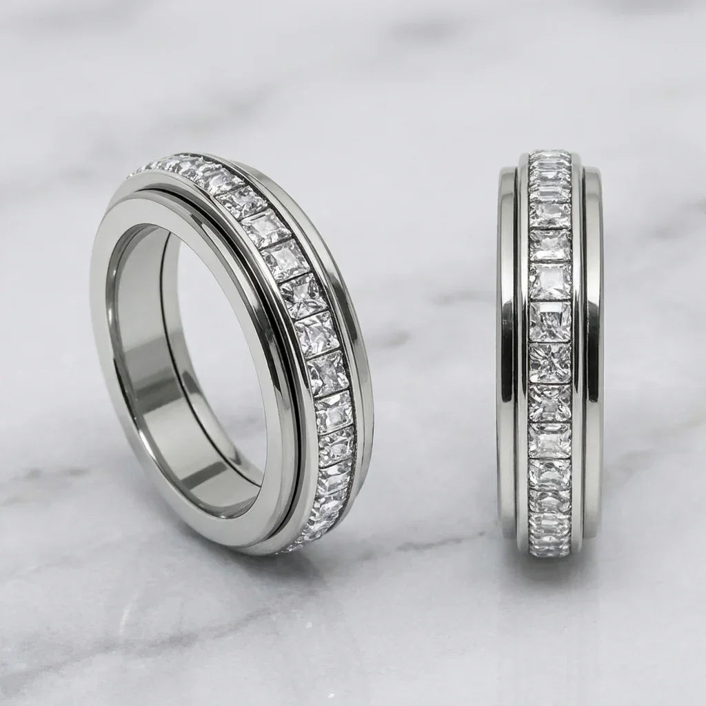 Rotating Anxiety Ring — spinner fidget ring with a free-spinning outer band, in silver gold and rose gold